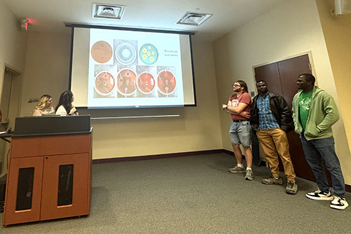 BMS students present at a TriBeta Biological Honor Society meeting.