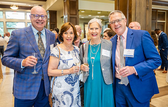 MAA members at party in Alumni Center.