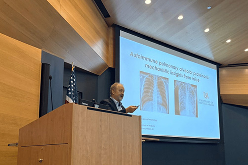 Dr. Robert A. Barrington presents at conference
